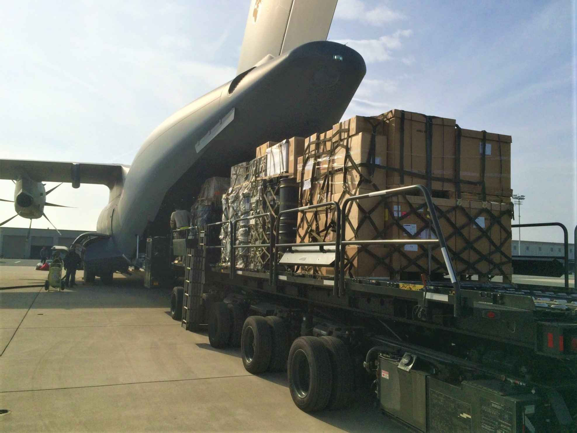 Cargo being loaded to airplane