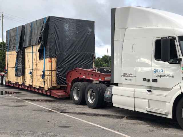 Oversize cargo on flatbed Geva truck